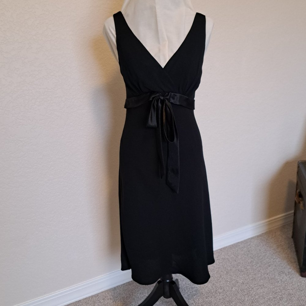 Flattering, A-line, V-neck (Front and Back), Sleeveless Black Cocktail Dress